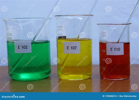 Food Colorings in a Beaker with E - Codes. Stock Photo - Image of glass ...