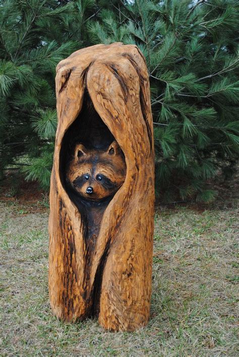 Peeking raccoon by kissel71 on DeviantArt | Wood carving art, Chainsaw ...