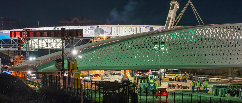 Construction of US enclosed arch bridge achieves major milestone  logo 