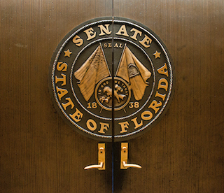 Photo of the Senate Chamber Doors with the Senate Seal