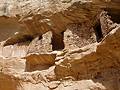 Ruins tucked in an alcove on the north canyon wall