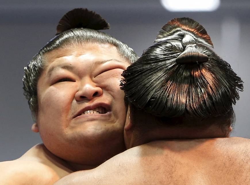 In pictures Hakuho headlines somber spring sumo festival at Yasukuni