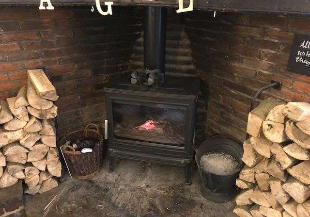 There are two chairs in front of the wood burner and they're probably the most popular seats in the pub