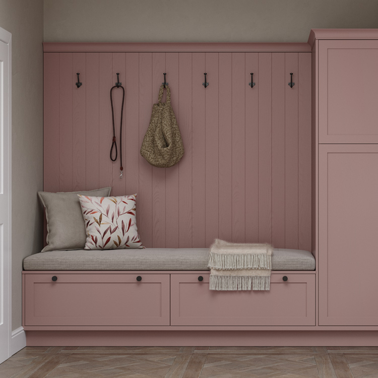 A pink mudroom seating area