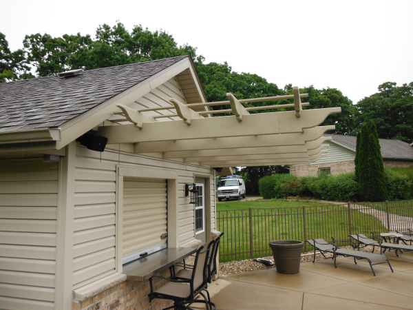 Custom shed with shutter window, bar, pergola, brick veneer and electric wiring