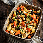 Roasted root vegetable cooked in coconut milk, and topped with salty, crunchy macademia nuts. | www.viktoriastable.com