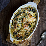 Spinach artichoke chicken casserole - this quick and easy recipe tastes like a cross between spinach artichoke dip, and chicken bake, takes 30 minutes to make, and is a great way to use leftover chicken or Thanksgiving turkey meat. | www.viktoriastable.com