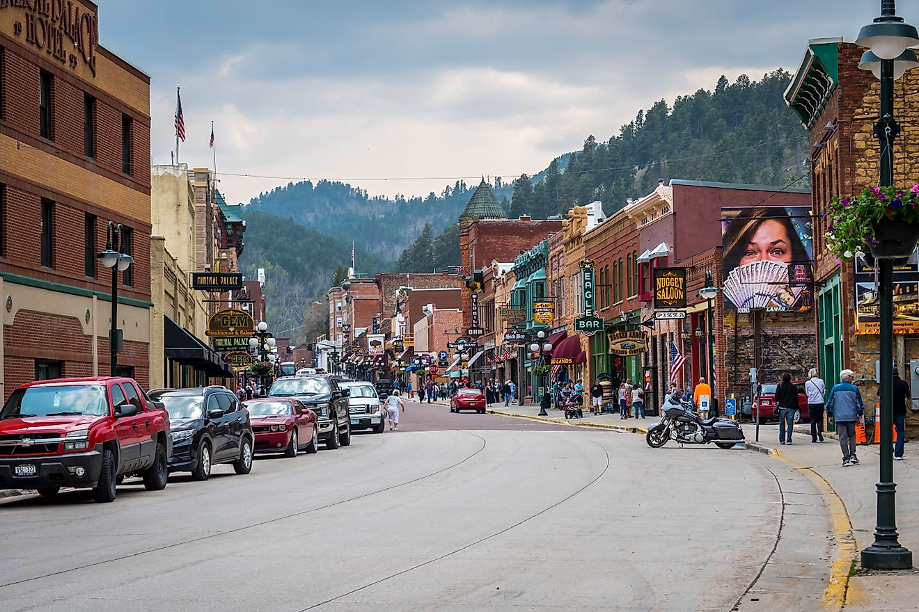 Rustic buildings lined along a street in the town of Deadwood, South Dakota. Editorial credit: Cheri Alguire / Shutterstock.com