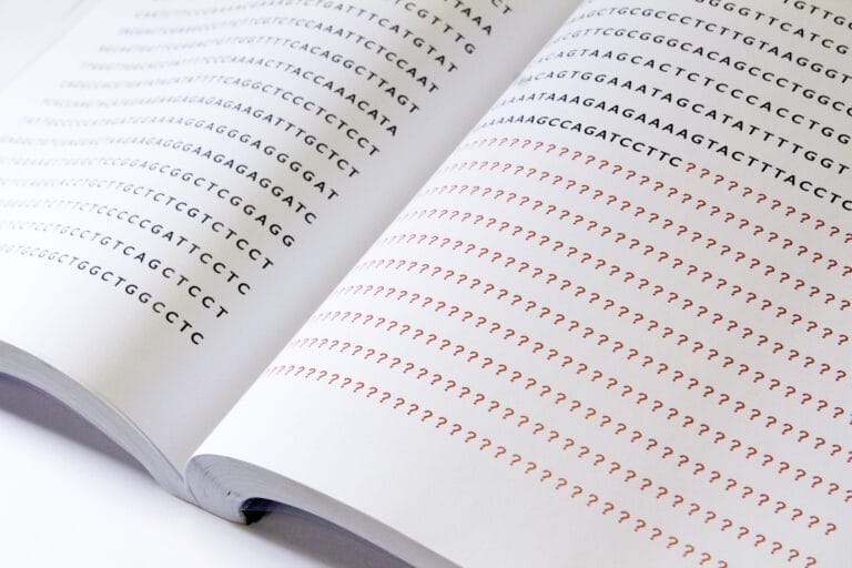 DNA sequencing letters in a book.