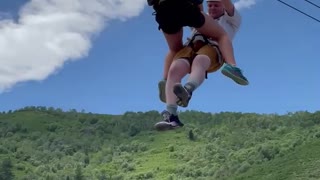 Spider-Girl Saves Man Stuck on Zipline