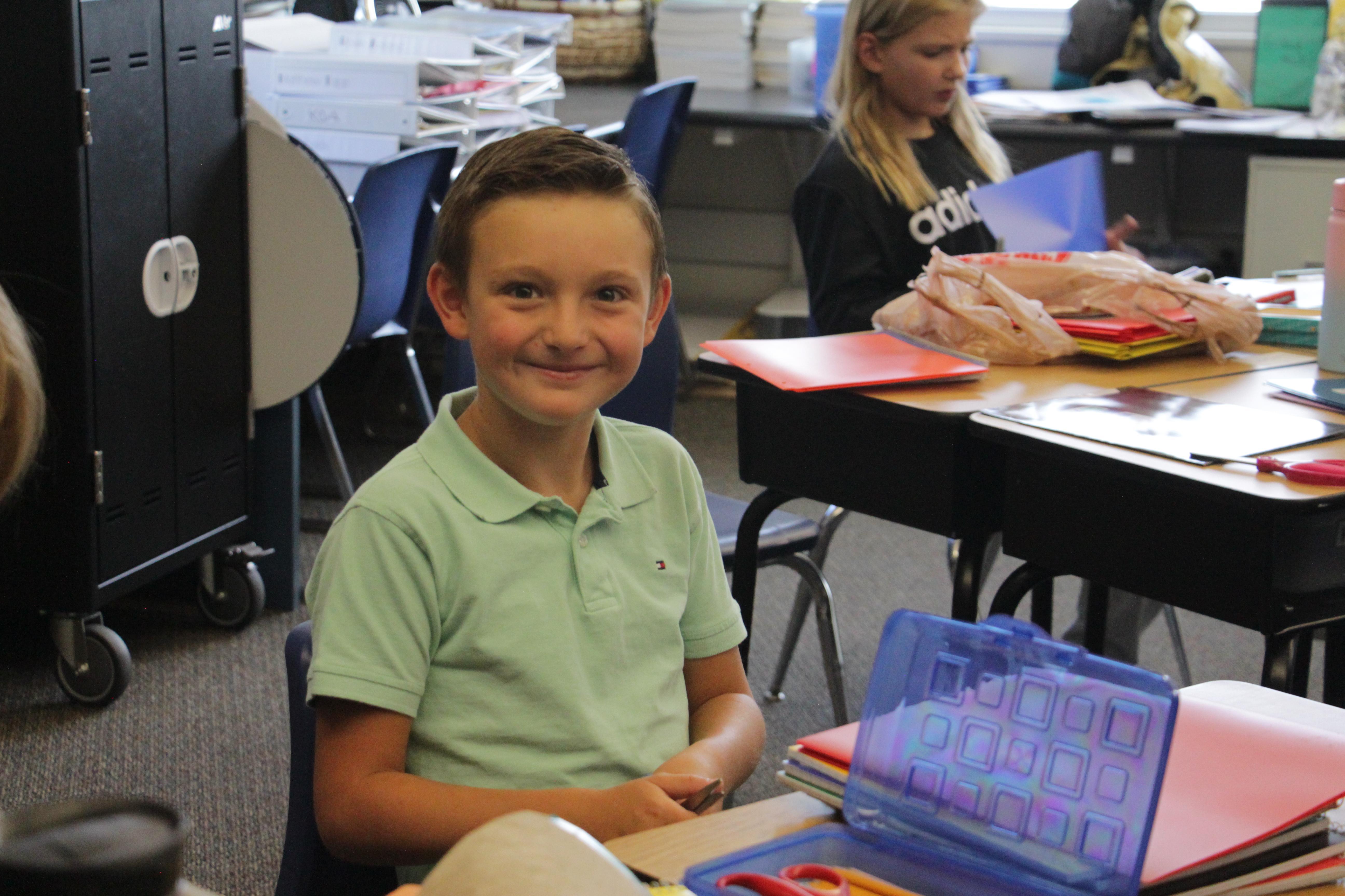 student smiling to camera