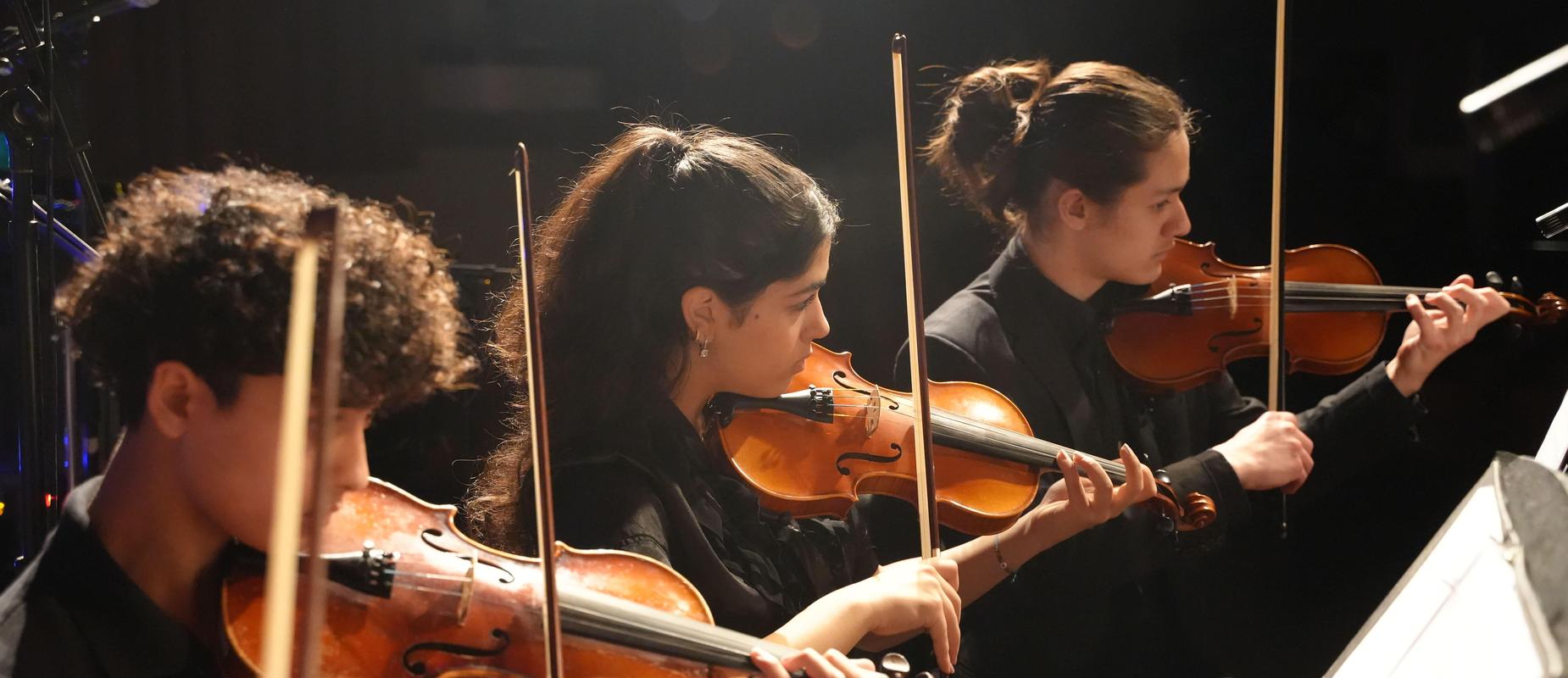 Students Playing the Violin