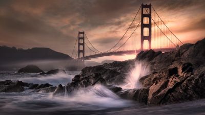 Golden Gate Bridge, California, Rocky coast, Water splash, Long exposure, Metal structure, Cloudy, Landmark, Dusk, Sunset