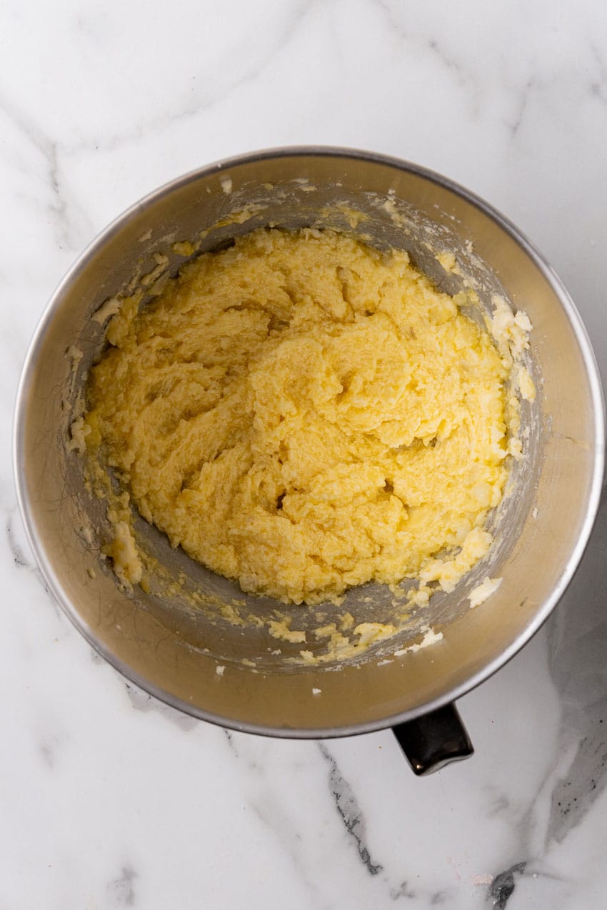 potato roll batter in a metal mixing bowl