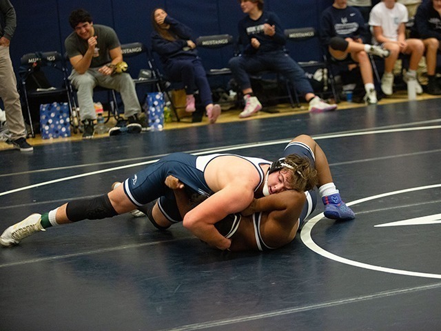 Varsity Wrestling Tops Holy Innocents in Home Dual, 53-30