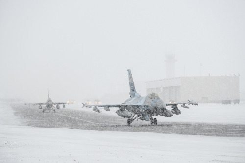 F-16 Fighting Falcons of the 18th Aggressor Squadron taxi down the runway at Eielson AFB, Alaska.
Photo: U.S. Air Force photo via Code One