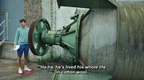 [ID: Three screencaps from Taskmaster. Ivo Graham stands outside an old factory, beside a huge cylindrical piece of metal machinery. He says nervously, “Obviously it’s very tempting to go, ‘Ha-ha, he’s lived his whole life in cotton wool, he’s never...