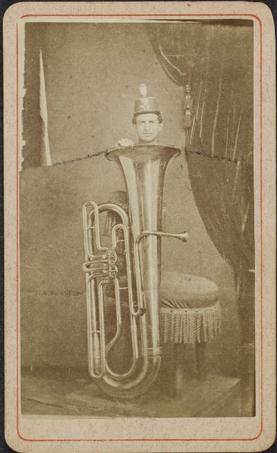 ca. 1860s, [composite carte de visite of a young man peering up from his tuba], M.C. Ragsdale