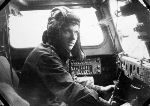 Soviet Army soldier in the cockpit of a PTS amphibious transport vehicle.