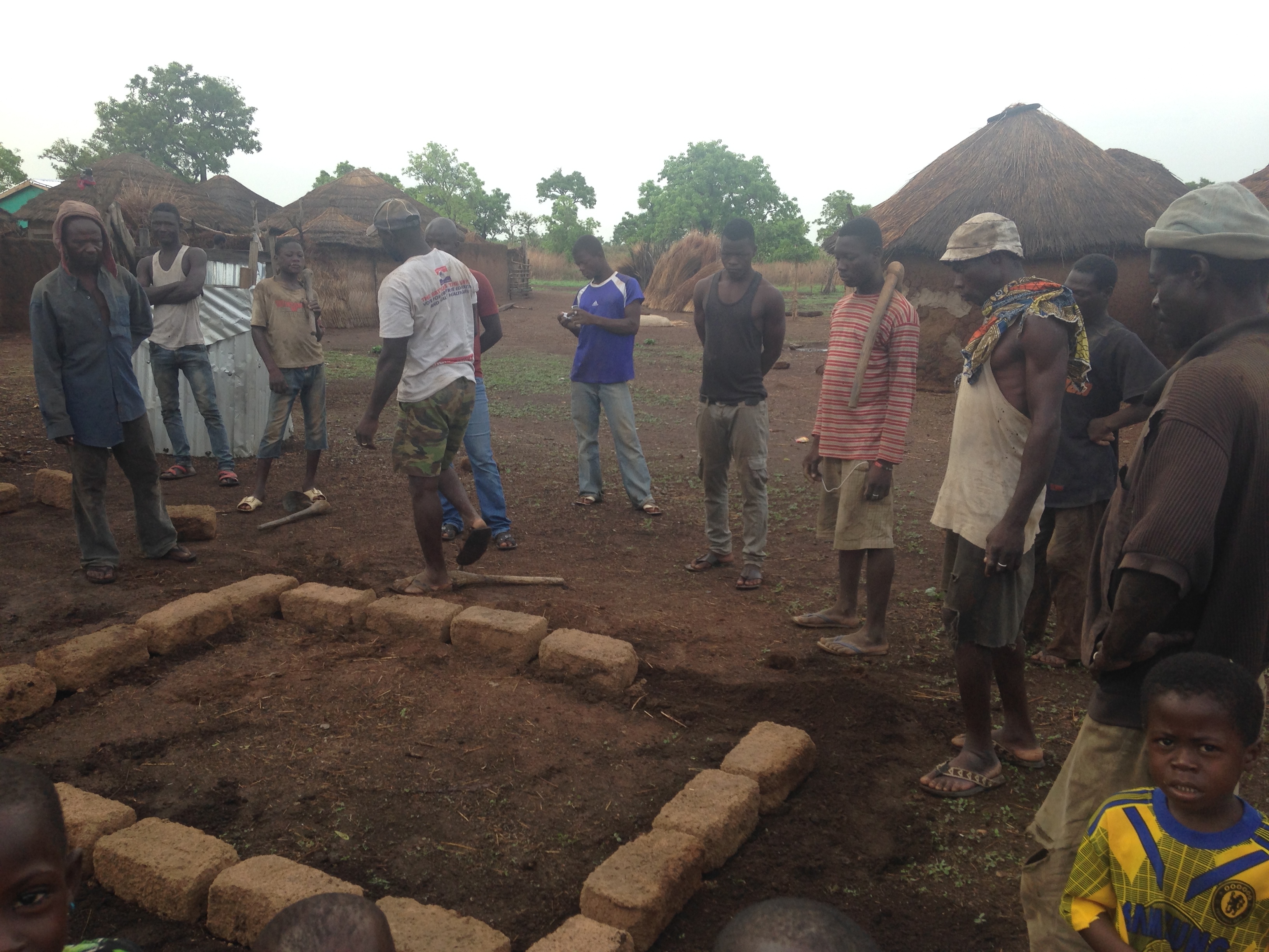 Laying the first row of bricks