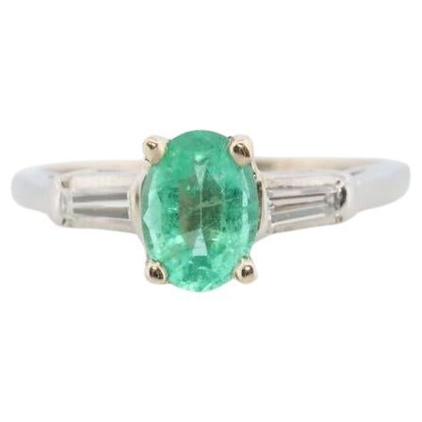 14k Oval Emerald and Baguette diamond ring. 14k white gold Green Emerald