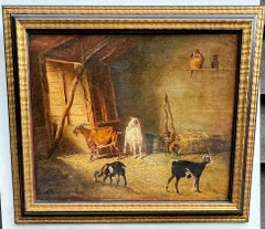 19th century English interior barn scene with a family of goats and baby goats.