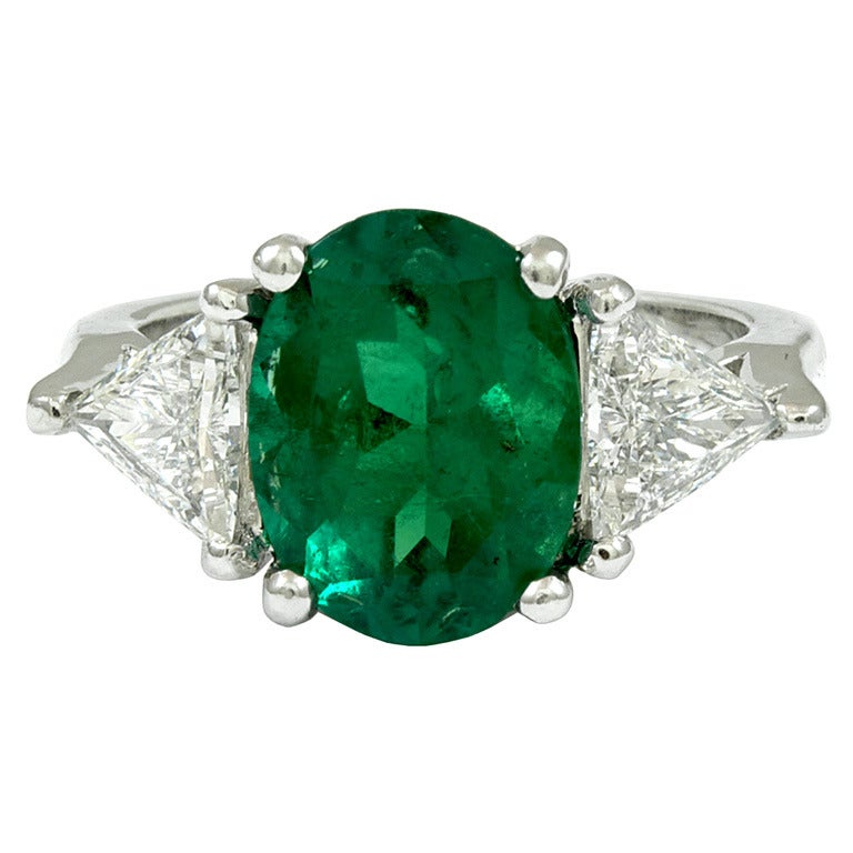 Oval Emerald Diamond Ring