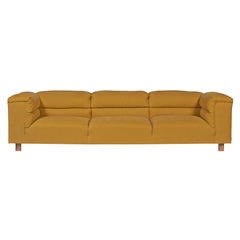 Cypress sofa upholstered in yellow fabric by Bow and Arrow