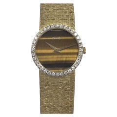 Piaget Yellow Gold Diamond Bezel and Tigers Eye Face Mechanical Wrist Watch