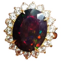 5.23cts Black Opal ring. Sterling Silver in 18K Gold Plated.