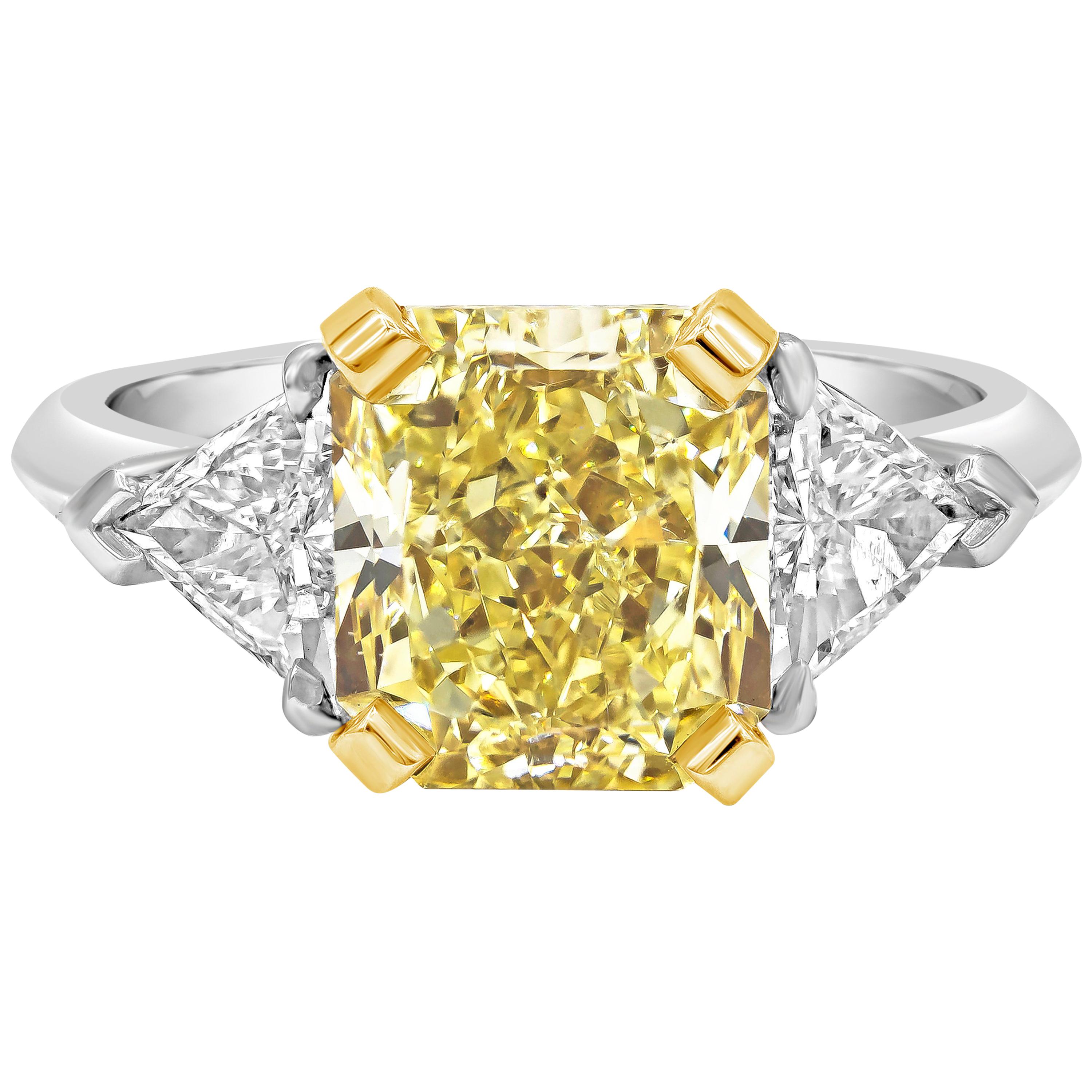 GIA Certified 4.06 Carats Radiant Cut Yellow Diamond Three-Stone Engagement Ring