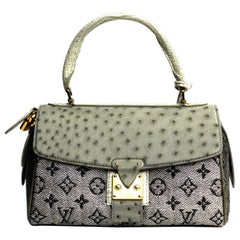 Louis Vuitton Limited Edition Comedie Carrousel Bag