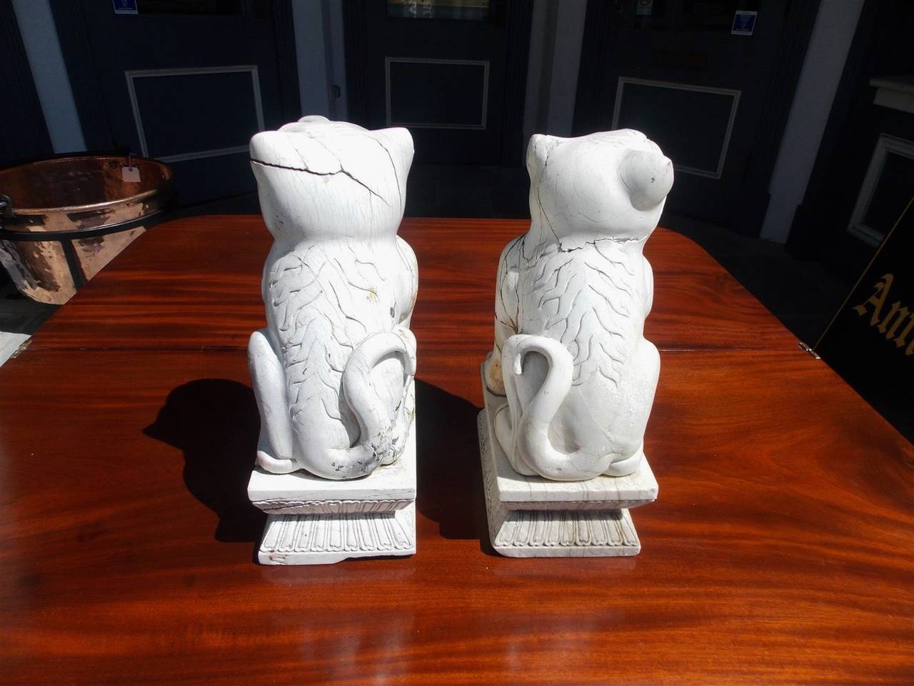 Pair of Chinese Carved Stone Foo Dogs on Rectangular Plinths, 20th Century In Good Condition For Sale In Charleston, SC