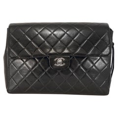 Vintage Chanel Black Lambskin Classic Flap Backpack