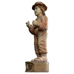 Figura de madera tallada de un mormón de principios del siglo XX