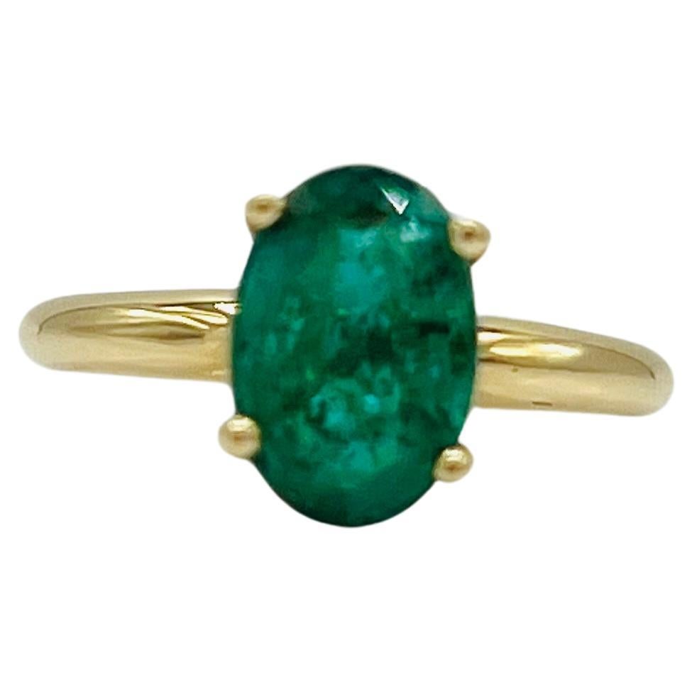 Emerald Oval and 14k Yellow Gold Ring