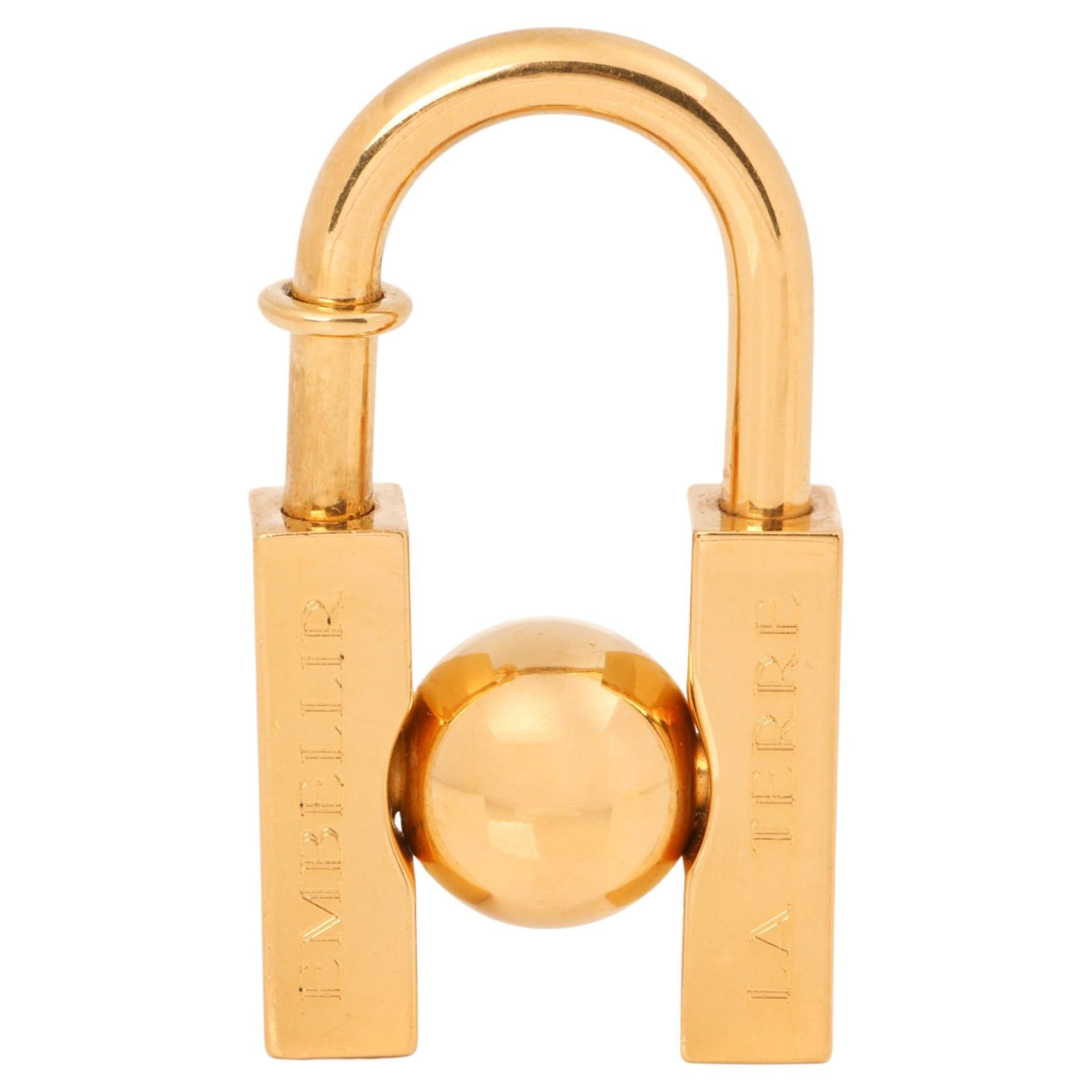 Hermès GOLD PLATED L'HOMME PEUT EMBELLIR LA TERRE CADENA CHARM