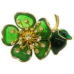 Iconic emerald poured glass 'camellia' brooch, Maison Gripoix for Chanel, 1960s