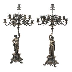 Pair of Eleven-Light Silvered Bronze Large Figural Candelabra