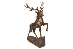 An Exceptional Life-Size Middle Eastern Gold-Inlaid Steel Deer Sculpture