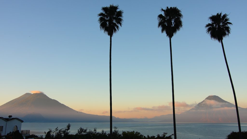 Lake Atitlan which includes landscape views, general coastal views and a sunset