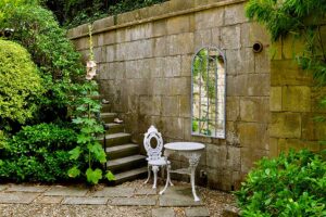 garden mirrors used to add light and interest