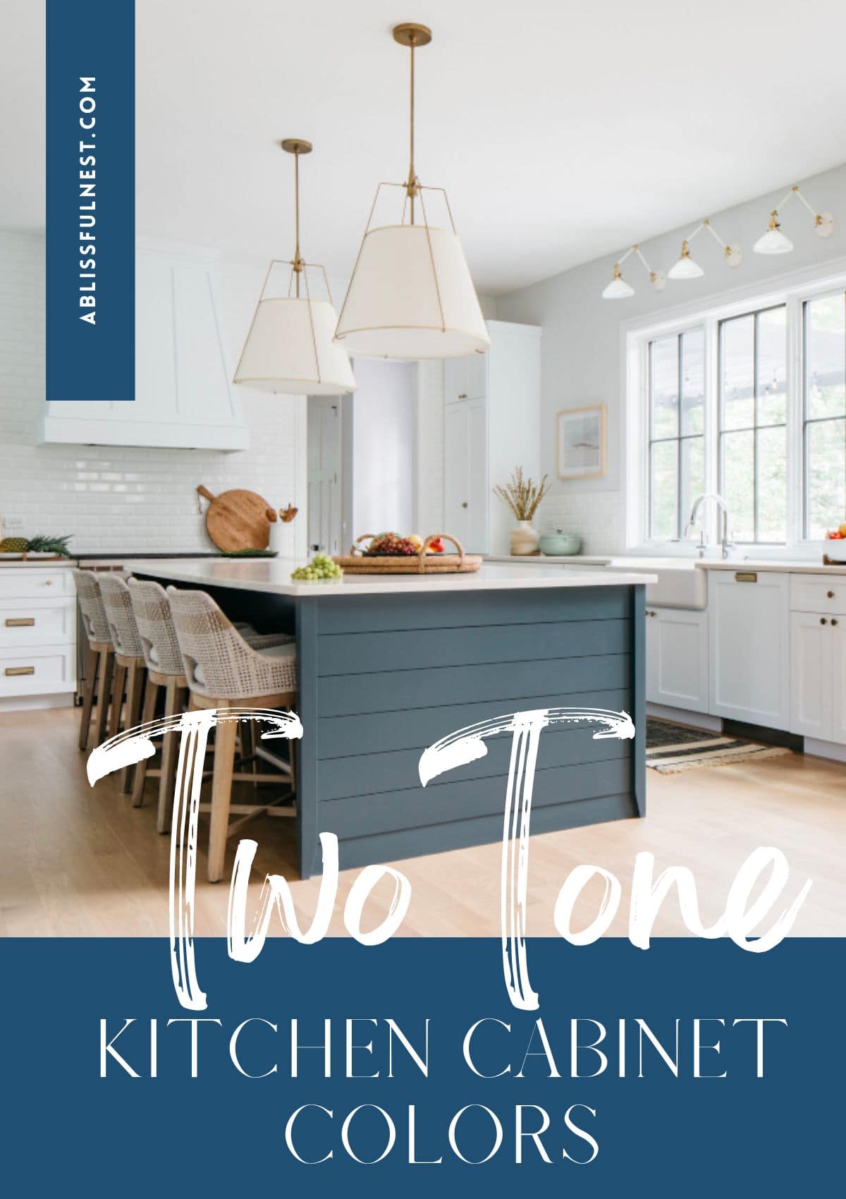 blue and white kitchen cabinets with gold pendant lights