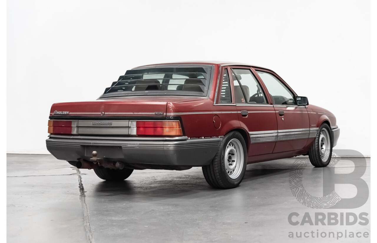 10/1986 Holden Commodore Executive VL 4d Sedan Maroon Turbo 2.5L - Modified