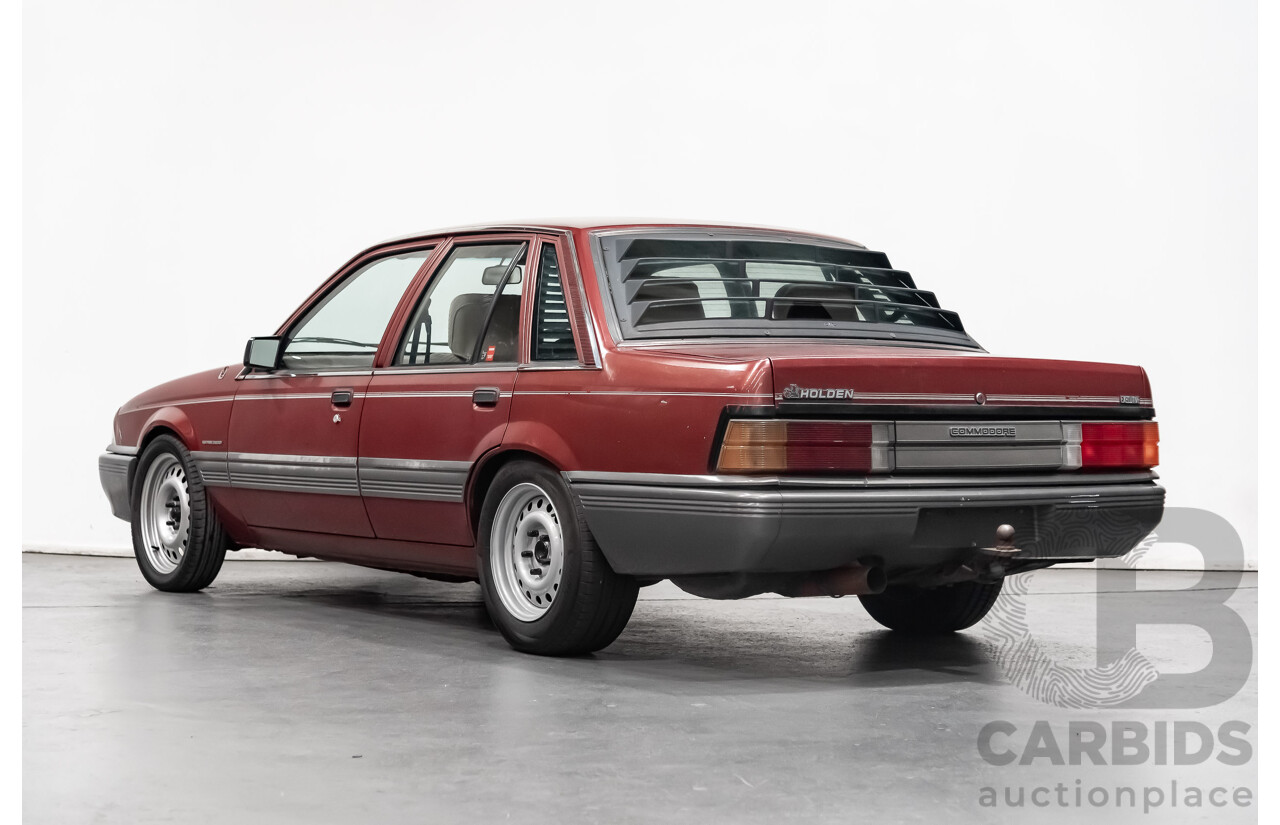 10/1986 Holden Commodore Executive VL 4d Sedan Maroon Turbo 2.5L - Modified