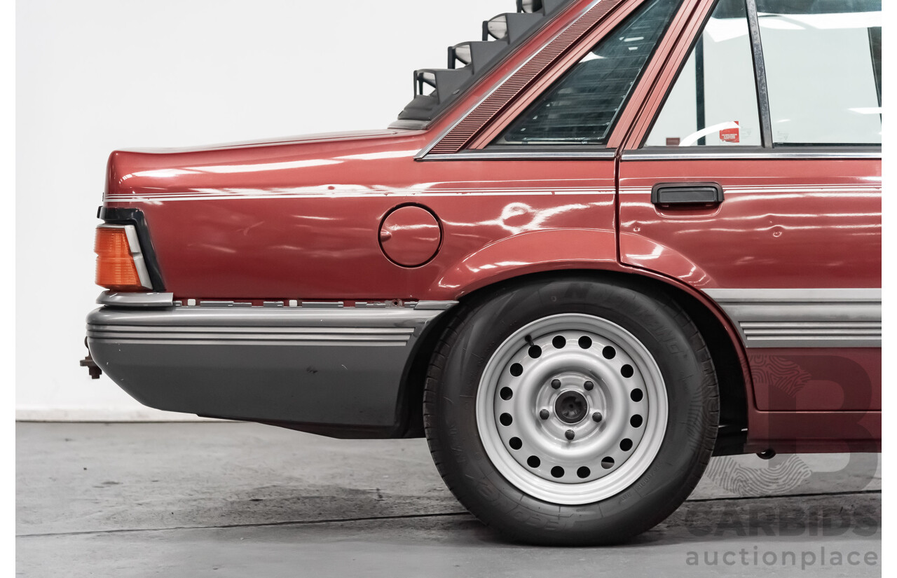 10/1986 Holden Commodore Executive VL 4d Sedan Maroon Turbo 2.5L - Modified