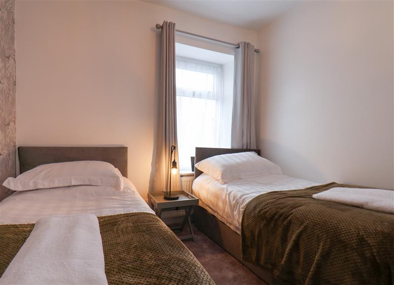 A bedroom in Stonerow Cottage at Stonerow Cottage, Lingdale near Boosbeck