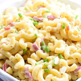 Southern Macaroni Salad Recipe - Southern Macaroni Salad makes a delicious addition for picnics, potlucks, and any get together! An easy make-ahead staple, this macaroni salad is a definite go-to recipe for your summer parties! // addapinch.com