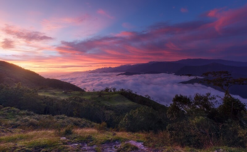 Beautiful sunset over the mountains in Minca overlooking Santa Marta, Colombia