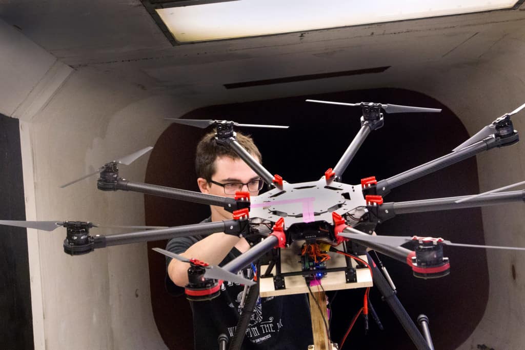 student holding Octodrone